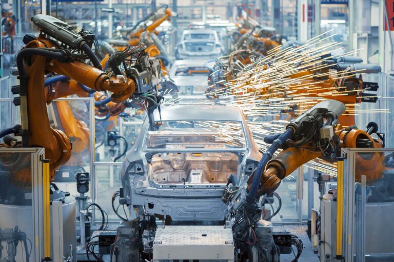 Advanced industrial robots used in an automobile manufacturing facility