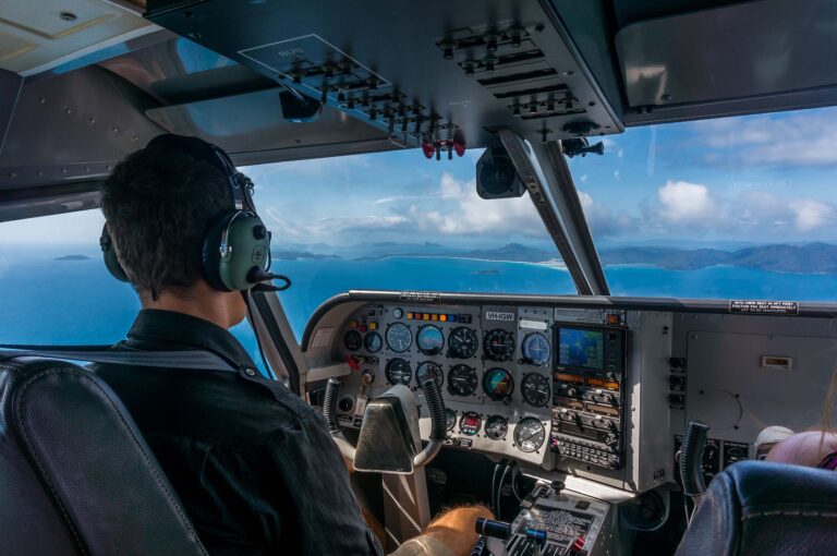 Pilot navigating his aircraft in a tropical archipelago